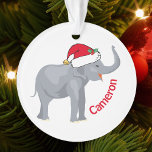 Adorno Elefante blanco lindo en Navidades Personalizados<br><div class="desc">Los animales vacacionales son mi parte favorita de los Navidades. Un bello elefante blanco vestido con un sombrero rojo de Papá Noel y que se ve feliz. Este adorno personalizado bonito me llena el espíritu de los Navidades.</div>