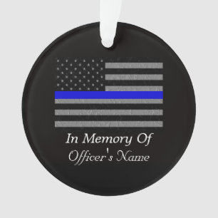 ADORNO EN MEMORIA DEL OFICIAL DE POLICÍA CAÍDO