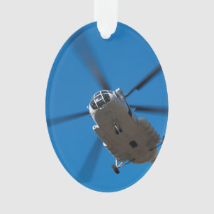 Adorno Helicóptero que asoma en cielo azul
