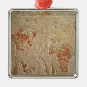 Adorno Metálico Alivio que representa a dos escultores que tallan