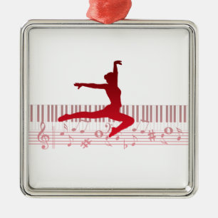 Adorno Metálico Bailarín de ballet en un teclado       