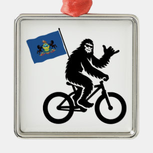 Adorno Metálico Bigfoot en bicicleta Bandera de Pensilvania