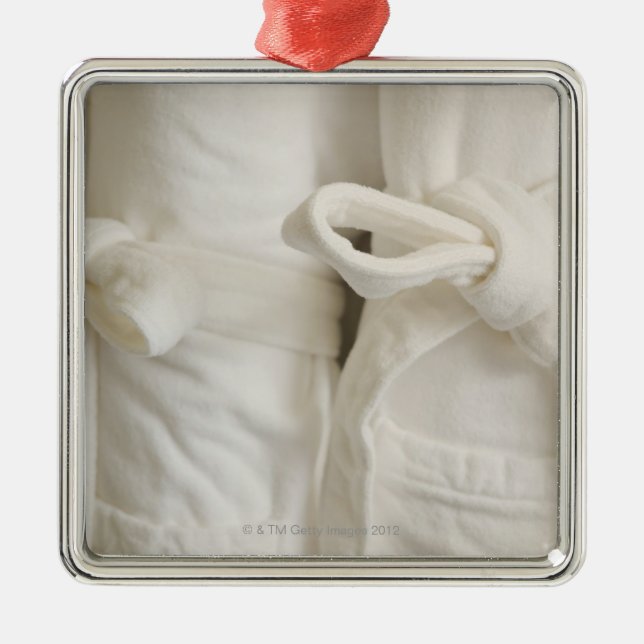 Adorno Metálico Ciérrese para arriba de toallas en balneario (Frente)