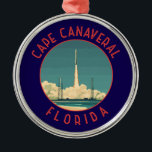 Adorno Metálico Círculo de angustia retro de la Florida de Cabo Ca<br><div class="desc">Diseño de viaje vectorial retro de Cabo Canaveral. El Cabo Canaveral es una ciudad de la costa atlántica de Florida. El Centro Espacial Kennedy,  al norte de la ciudad,  cuenta con una simulación de lanzamiento de un transbordador de la NASA y memorabilia de astronautas.</div>