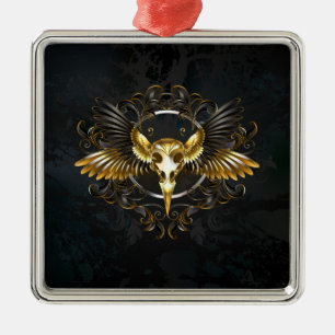 Adorno Metálico Cráneo de pájaro dorado sobre fondo negro