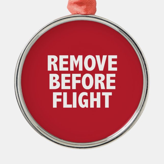 Adorno Metálico Eliminar antes del vuelo (Frente)