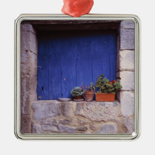 Adorno Metálico Europa, Francia, Cereste. Una puerta azul añade c