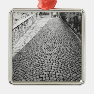 Adorno Metálico Europa, Suiza, Zúrich. Calle empedrada,
