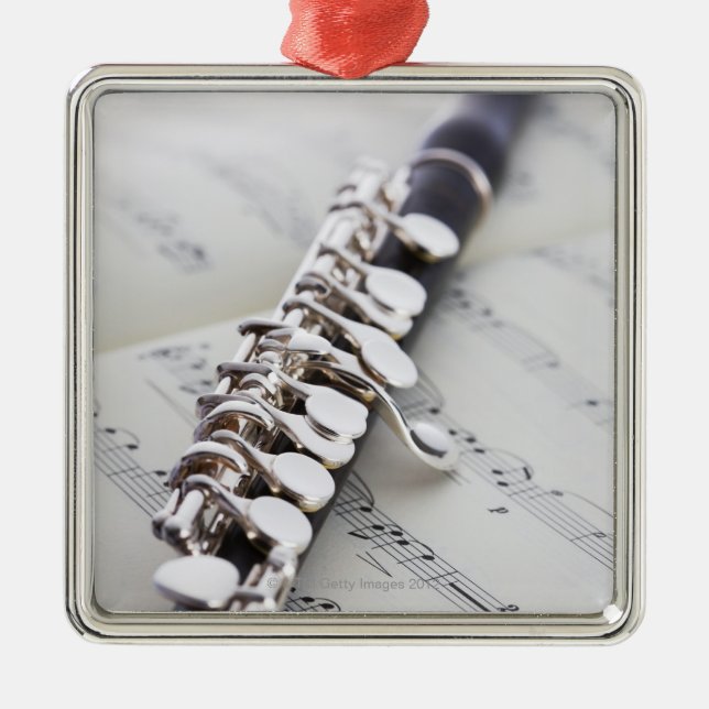 Adorno Metálico Flautín en una cuenta (Frente)