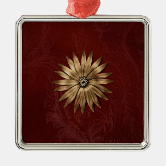 Adorno Metálico Flor metálica de oro sobre tela roja (Frente)
