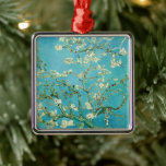 Adorno Metálico Flores de almendra | Vincent van Gogh<br><div class="desc">Flores de almendra (1890) del artista holandés Vincent van Gogh (1853-1890). La pintura de Van Gogh en Almond Blossoms muestra delicadas flores blancas frente a un vibrante cielo turquesa, simbolizando la nueva vida y renovación. Inspiradas por el arte japonés, las elegantes ramas y las líneas fluidas crean una sensación de...</div>