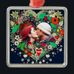 Adorno Metálico Foto personalizada de marco floral cardíaco<br><div class="desc">flores de color rojo bonito,  azul oscuro y beige llamativo arte folclórico estilo corazón floral. Agregue una imagen de usted y su compañero en el área de personalización. Dulce y romántico adorno navideño personalizado.</div>