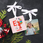Adorno Metálico Foto personalizada de vintage Christmas Elmo<br><div class="desc">Este adorno metalizado festivo presenta un diseño de estilo vintage de Elmo, de Plaza Sésamo, que aporta alegría navideña a sus decoraciones. El adorno incluye texto de personalizable para añadir un nombre y espacio para una foto personal, lo que lo convierte en un conservador único. Perfecto para los amantes de...</div>