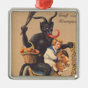 Adorno Metálico Krampus montando un caballito con un niño