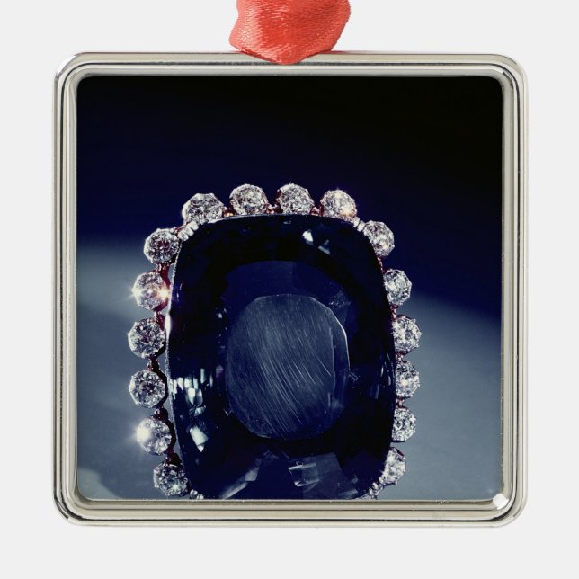 Adorno Metálico La broche de Logan (Frente)