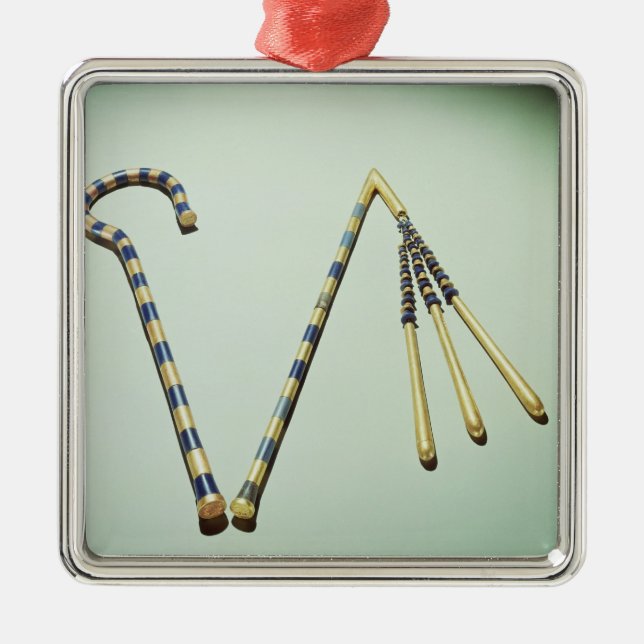 Adorno Metálico Ladrón y mayal, de la tumba de Tutankhamun (Frente)