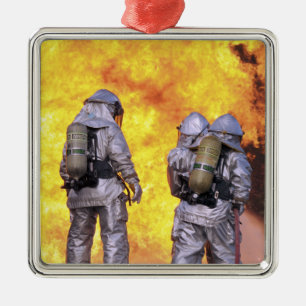 Adorno Metálico Los bomberos extinguen un fuego de aviones