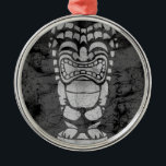 Adorno Metálico Makapuu Beach Hawaiian se ríe Tiki Batik<br><div class="desc">Un diseño de tiki riéndose con textura de batik. Este tiki es reminiscente de los diseños usados en camisetas de aloha vintage en los años cuarenta y cincuenta. Este diseño se presenta en varios colores.</div>
