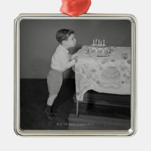Adorno Metálico Muchacho que sopla hacia fuera velas