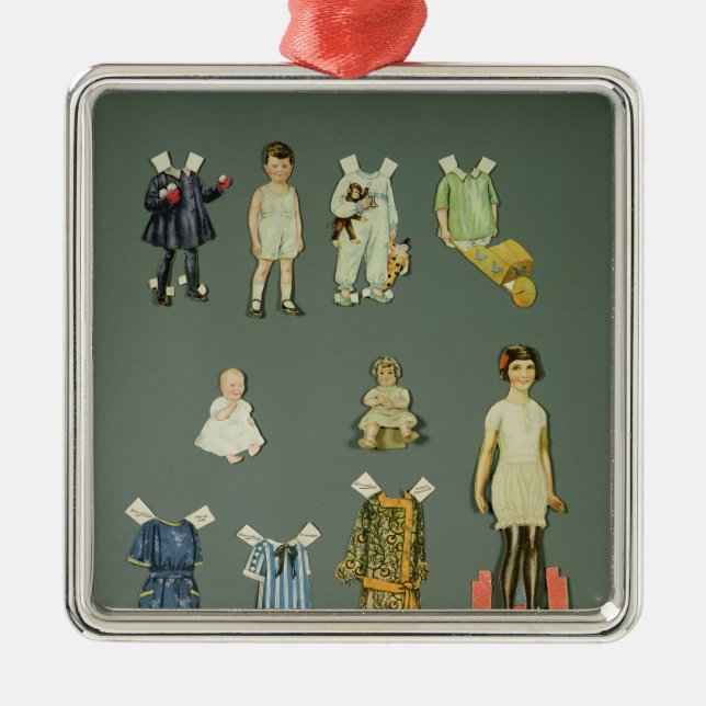 Adorno Metálico Muñeca y ropa cortadas, los últimos años 30 (Frente)