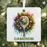Adorno Metálico Nombre personalizado de navidades Pickleball<br><div class="desc">Celebra la temporada de fiestas con nuestro encantador ornamento de Pickleball, perfecto para los amantes del deporte! Este encantador diseño cuenta con un baile de pelotas con un sombrero de Santa, acompañado de un remo que le da un toque divertido. El fondo muestra una hermosa acuarela de ramas de pino,...</div>