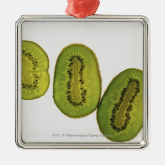Adorno Metálico Primer de cinco rebanadas de fruta de kiwi