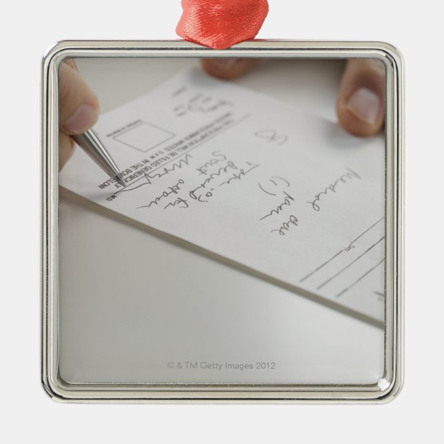 Adorno Metálico Primer de las manos que firman la prescripción (Frente)