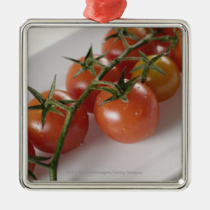 Adorno Metálico Primer de tomates en una bandeja