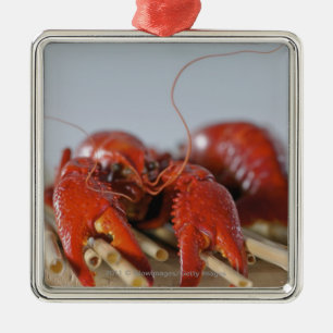 Adorno Metálico Primer de un cangrejo en los palillos