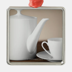 Adorno Metálico Primer de una taza y de un platillo con una
