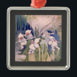 Adorno Metálico Snow Faeries Making Snow<br><div class="desc">vintage fairylands painting of snow fairies making snow dressed in white fluffy hooded coats, pretty pink wings and fur lined trousers working and pushing snow covers sticks around a snow mill to churn and make snow. vintage illustrative watercolor fairyland painting of fairies on top of a mountain manufacturing snow by...</div>