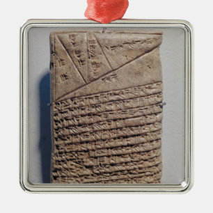 Adorno Metálico Tableta con catorce líneas de un texto matemátic