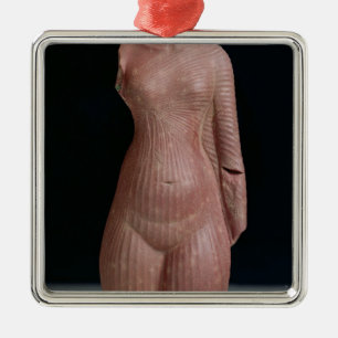Adorno Metálico Torso femenino, probablemente reina Nefertiti