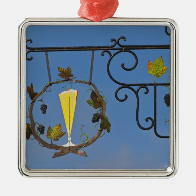 Adorno Metálico Un cartel de hierro forjado que ilustra el tema (Frente)