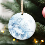 Adorno Navidades de acuarela Winter Wonderland<br><div class="desc">¡Trae magia de vacaciones a tu árbol con nuestros Navidades de acuarela Ornamento de Invierno! Este bonito ornamento está decorado con un encantador diseño acuático que representa un tranquilo paisaje de invierno con árboles nevados y cielos serenos. Este adorno, hecho con cerámica de alta calidad o materiales duraderos, refleja la...</div>