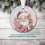 Adorno Nieta Navidades rosados Rose Bouquet Santa<br><div class="desc">¡Aquí hay un adorno navideño para esa nieta, hija o sobrina especial! Una imagen clásica de Santa Claus se ve vestida de rosa y asomada a un ramo de rosas rosas. La imagen se coloca en un fondo de color rosa y lavanda. La parte posterior del ornamento tiene el mismo...</div>