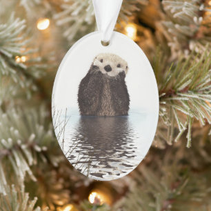 Adorno Otter sonriente adorable en el lago