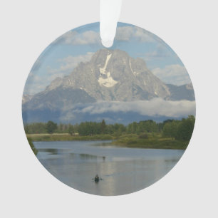 Adorno Remo en kayak en el Parque Nacional Grand Teton