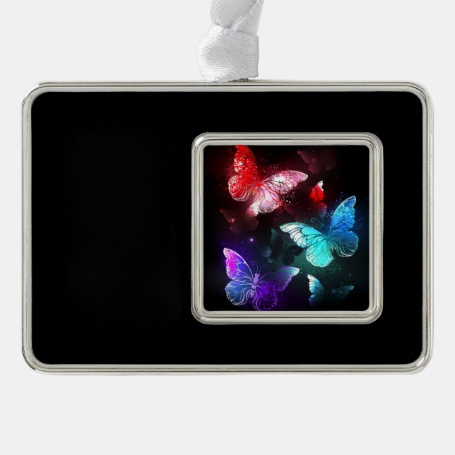 Adorno Tres mariposas brillantes en el fondo nocturno (Anverso)