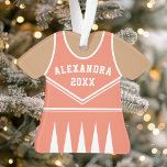 Adorno Uniforme de animadores corales personalizados<br><div class="desc">Celebra el espíritu de tu animador con este adorno personalizado de animador de coral. Perfecto para conmemorar una temporada especial,  equipo o logro individual. Personalizar con un nombre y un año para crear un keepsake único.</div>