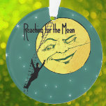 Adorno Vintage Winter Moon Man Ladder llega a la luna<br><div class="desc">Esta imagen vintage tiene una gran luna sonriente amarilla con cara. Un hombre con traje sube una escalera de bata a la luna. El texto dice "Llegar a la luna en un verde con brillantes estrellas". Vea mi tienda Arte de MAR para encontrar productos que coincidan con este diseño.</div>