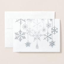 Adornos de copo de nieve en tarjeta de papel metál