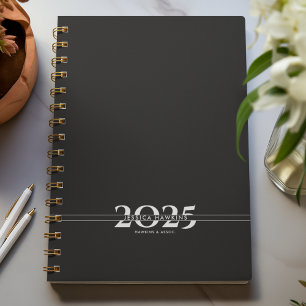 Agenda Año de división semanal de texto superpuesto negro