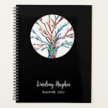 Agenda Árbol personalizado de vida negro<br><div class="desc">Planificador de árbol personalizado de la vida 2022. Este elegante Planner está decorado con un diseño de un árbol de la vida en colores arcoiris sobre un fondo negro. Personalizable fácil con tu nombre y año. Porque creamos nuestra propia obra de arte no encontrarás esta imagen exacta de otros diseñadores....</div>