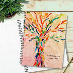 Agenda Árbol ruso personalizado<br><div class="desc">Este único Planner está decorado con un árbol de color arcoiris sobre un fondo beige. El diseño original se hizo en mosaico con pequeños trozos de vidrio de colores vivos. Personalizar con tu nombre y año. Utilice la opción Herramienta de diseño para cambiar el tamaño, estilo o color del texto....</div>