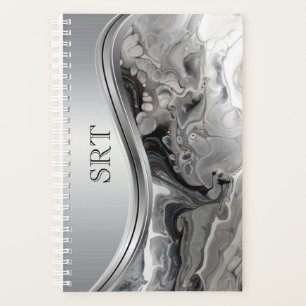 Agenda Arte fluido negro plateado con monograma de metal