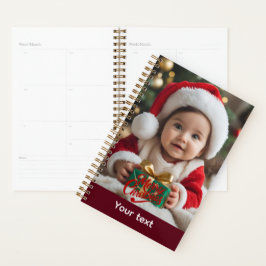Agenda Bebé Adorable en traje de Santa con regalo de Navi