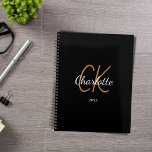 Agenda Black gold monogram initials name minimalist 2023<br><div class="desc">Black background,  golden and white text. Personalize and add your name,  monogram initials,  and year. (any year) golden and white letters.  The name is written with a hand lettered style script.</div>