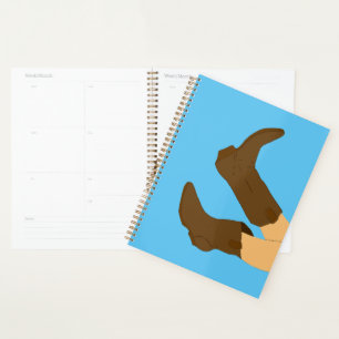 Agenda Boots de vaquero en fondo azul claro