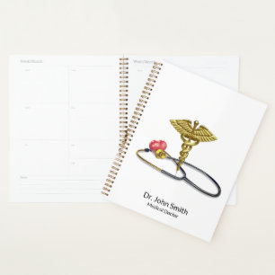 Agenda Caduceo de oro y estetoscopio médico con corazón